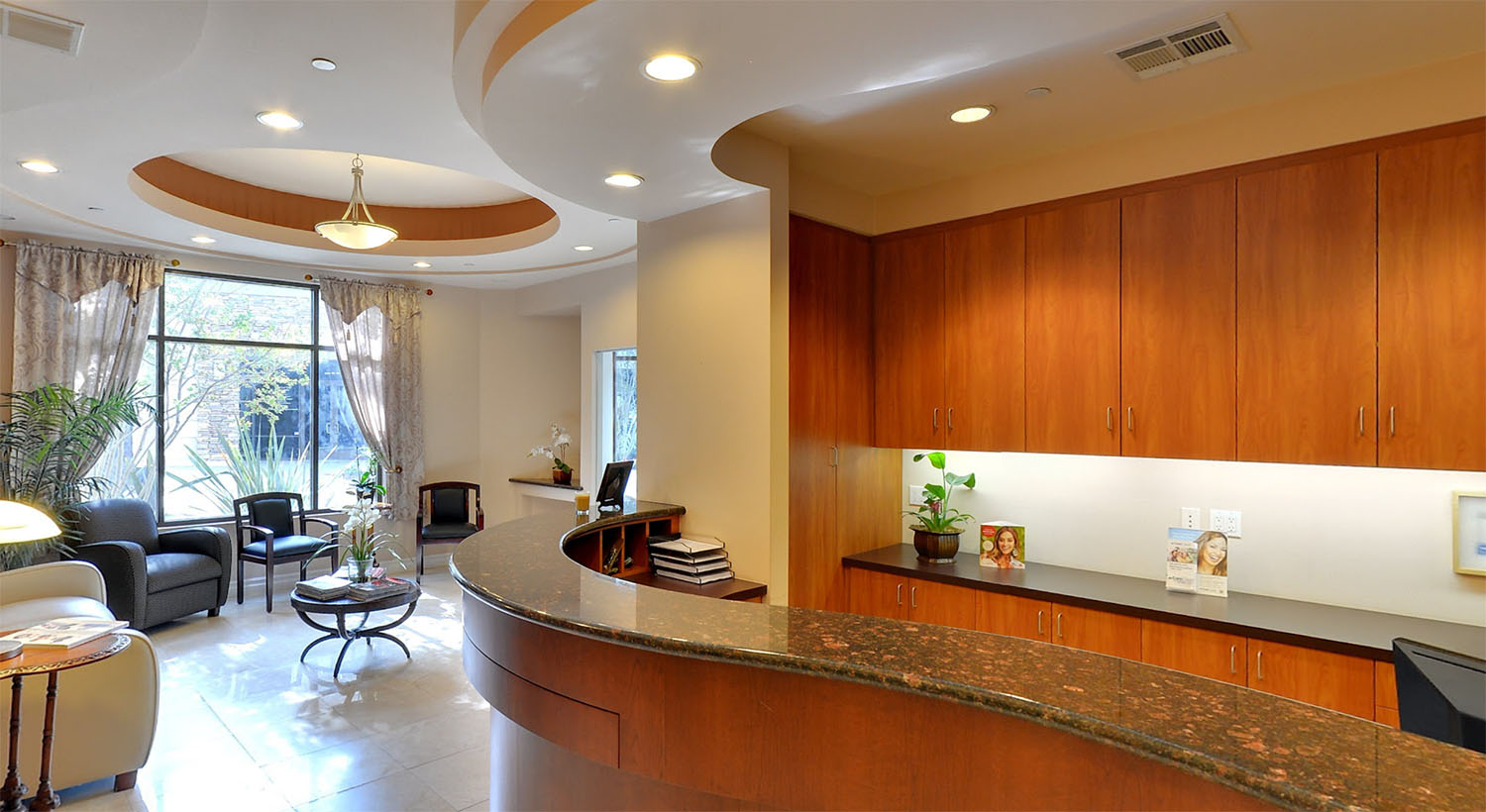 Reception desk and waiting area of the Craft Dental office