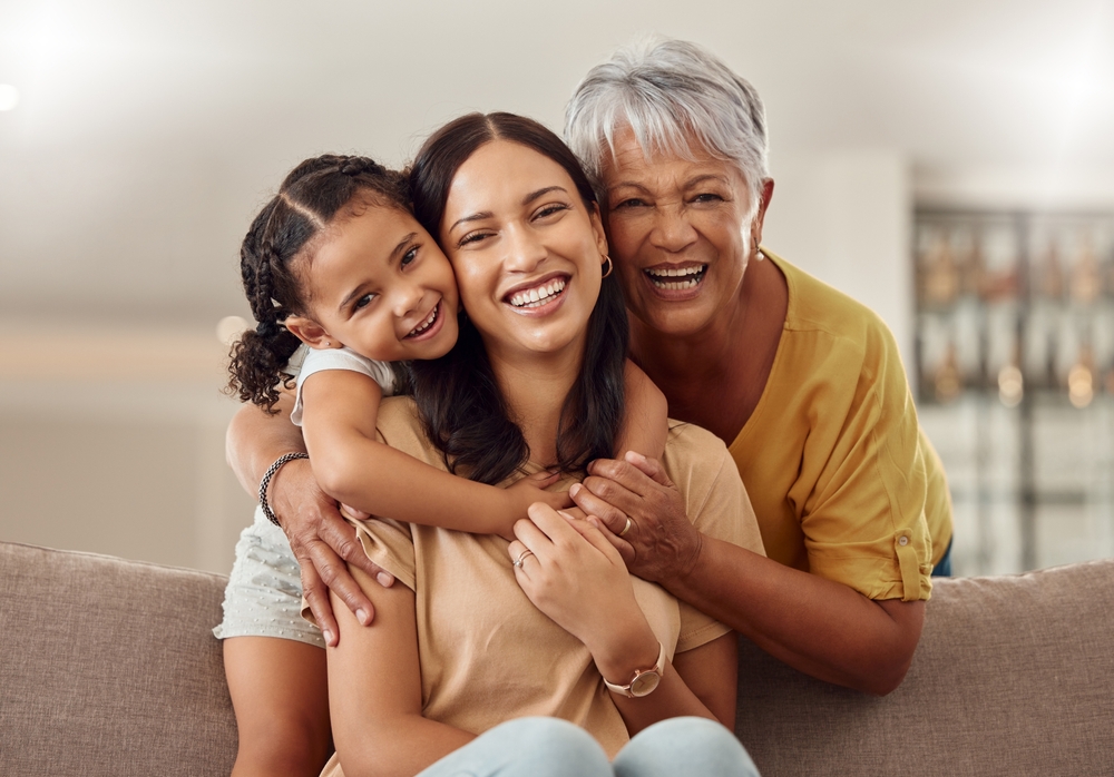 Three generations of smiling women showing confidence after Dental Bonding treatment at Craft Dental