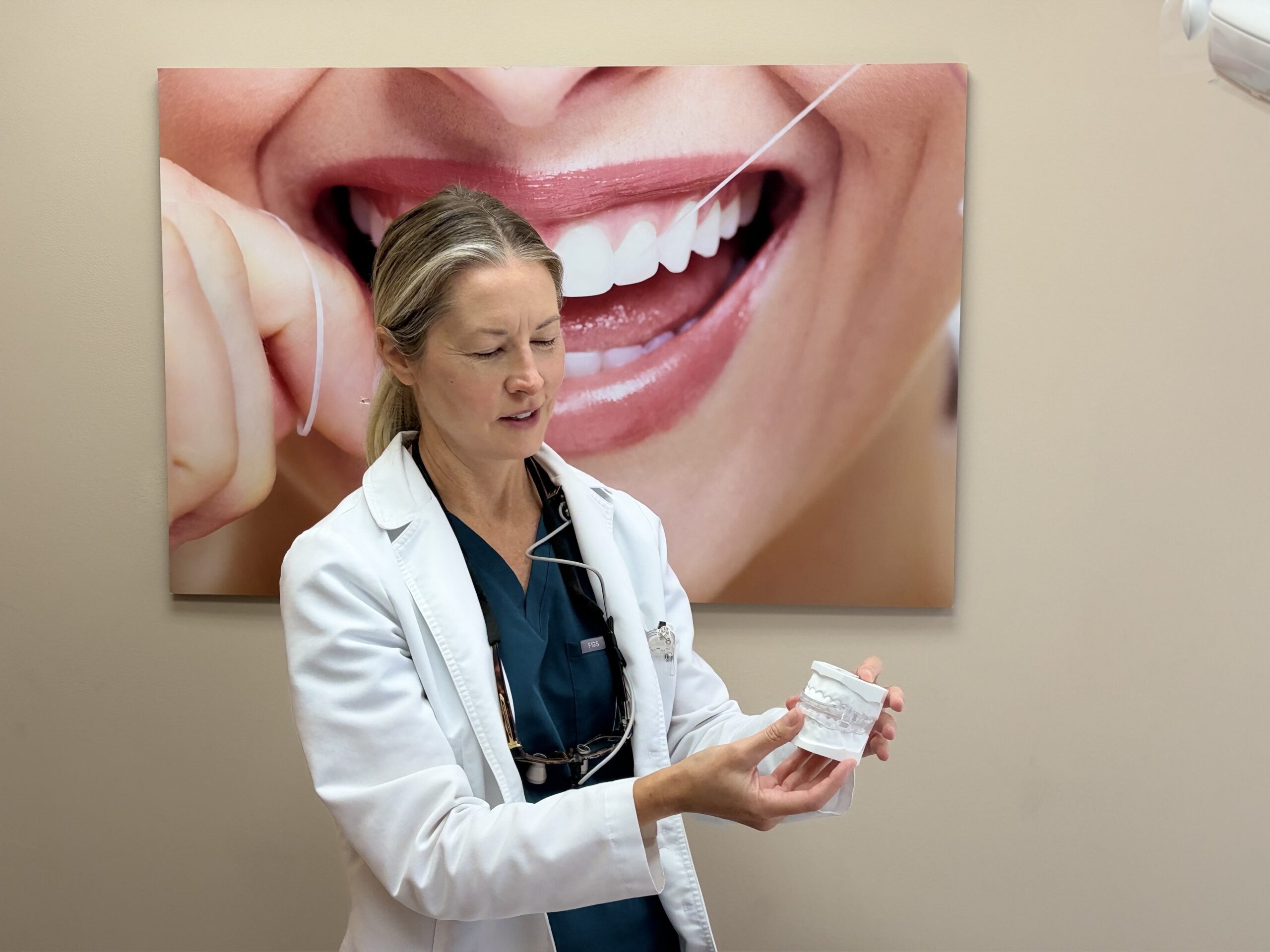 Dr. Diana Craft smiling with oral sleep appliance